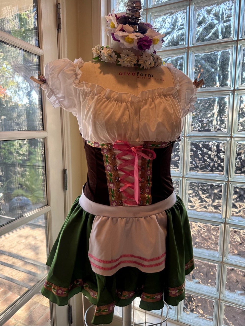 Bavarian/Oktoberfest-inspired beer maid costume and includes the flower crowns